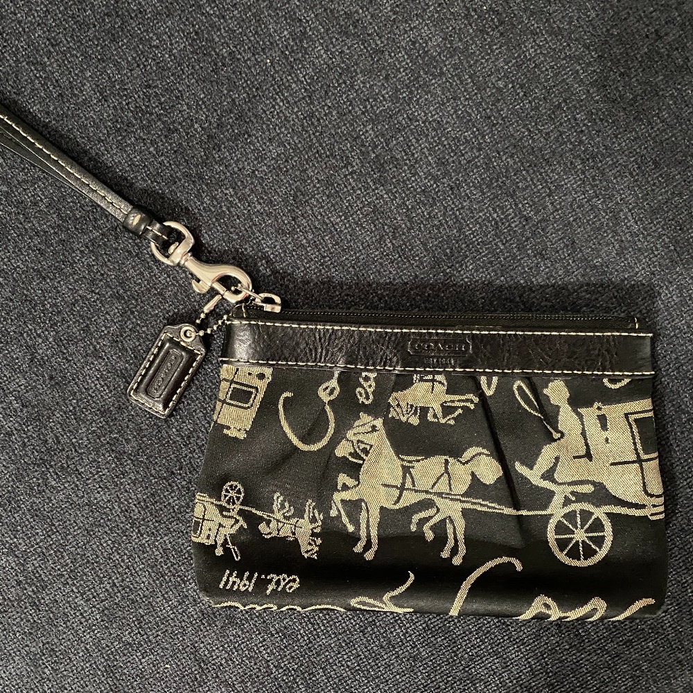 Coach leather trim wristlet in horse/carriage fabr